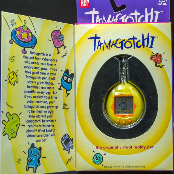 1996 Bandai Virtual Pet Handheld System Tamagotchi Yellow with Orange