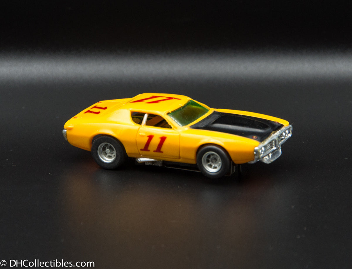 USED A/FX HO Yellow w/ Black # 11 Road Runner Slot Car