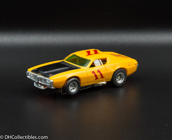 USED A/FX HO Yellow w/ Black # 11 Road Runner Slot Car