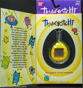 1996 Bandai Virtual Pet Handheld System Tamagotchi Yellow with Orange 