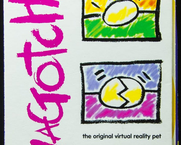 1996 Bandai Virtual Pet Handheld System Tamagotchi Yellow with Orange 