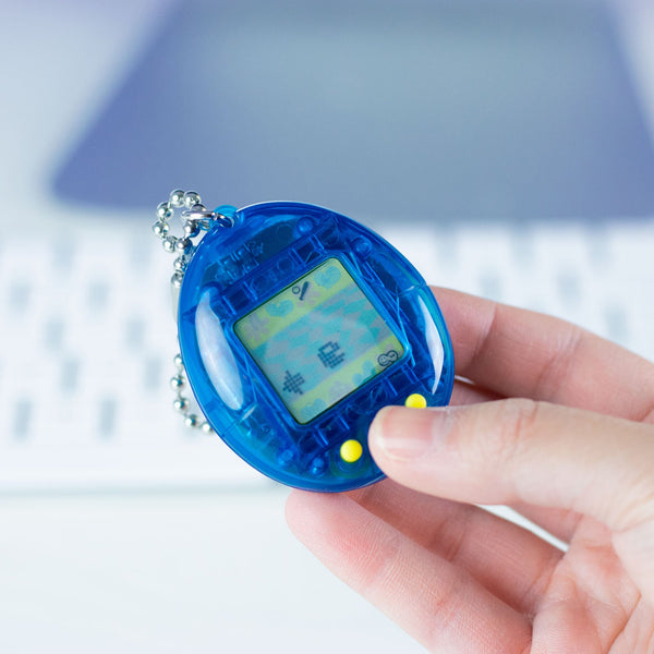 2021 Bandai Virtual Pet Handheld System Tamagotchi Translucent Blue with Yellow Buttons